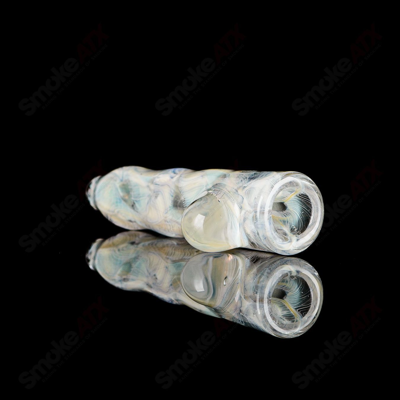 Signed JMK Glass #4 I/O Worked Chillum, clear hand-blown glass smoking pipe with intricate worked designs.