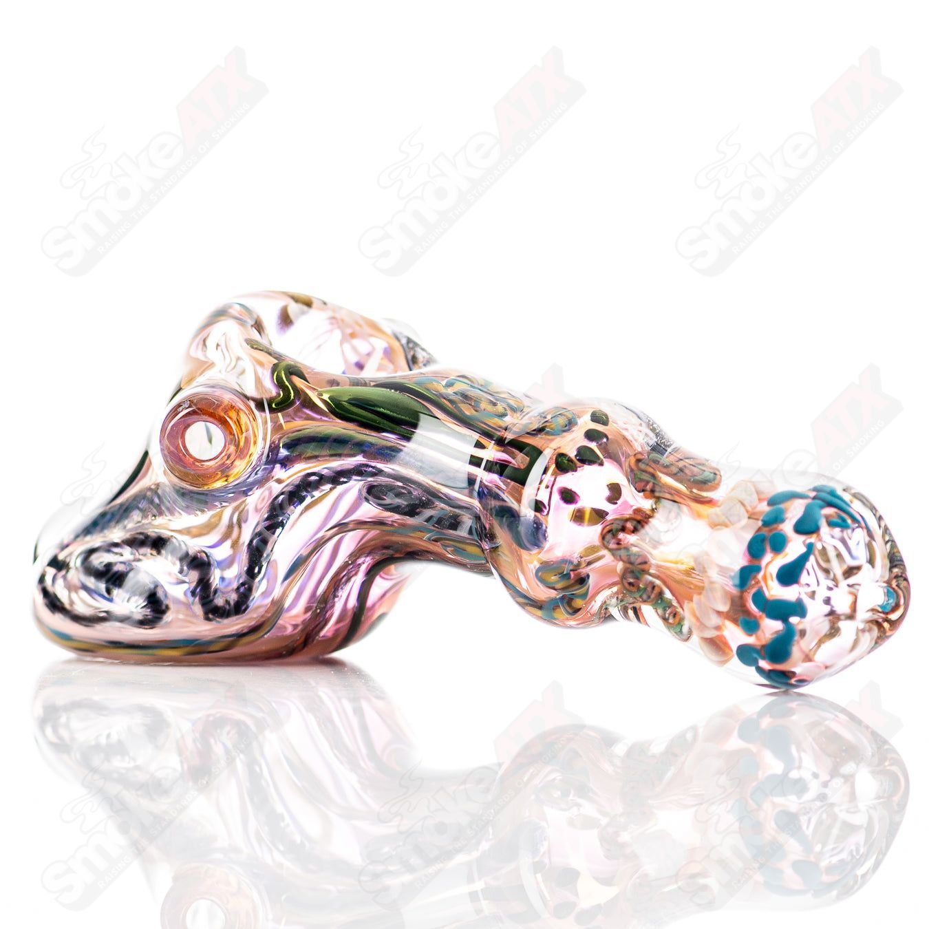 Molten Imagination ISO Montage Chaos Club glass hand pipe with colorful, abstract design and intricate details.
