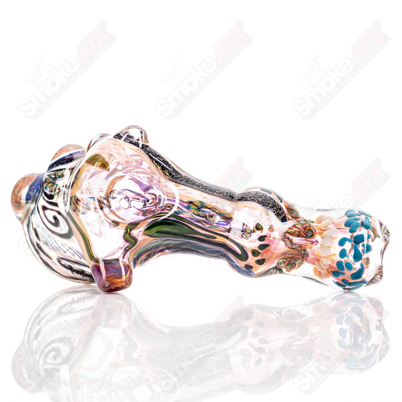 Molten Imagination ISO Montage Chaos Club glass hand pipe with intricate design and vibrant colors.