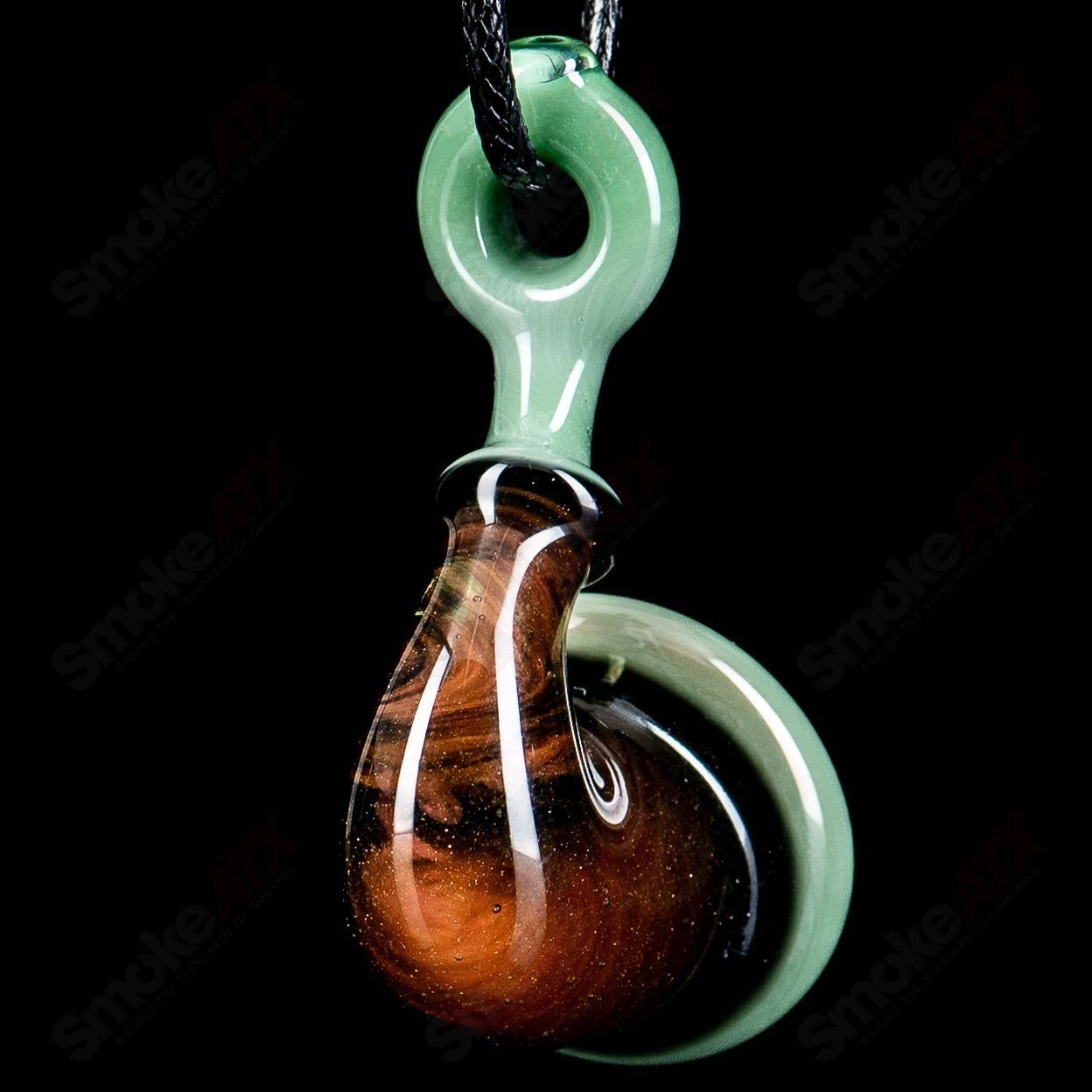 JMass #4 Sherlock pendant made of heady glass, featuring intricate glasswork and a classic Sherlock shape on a jewelry chain.