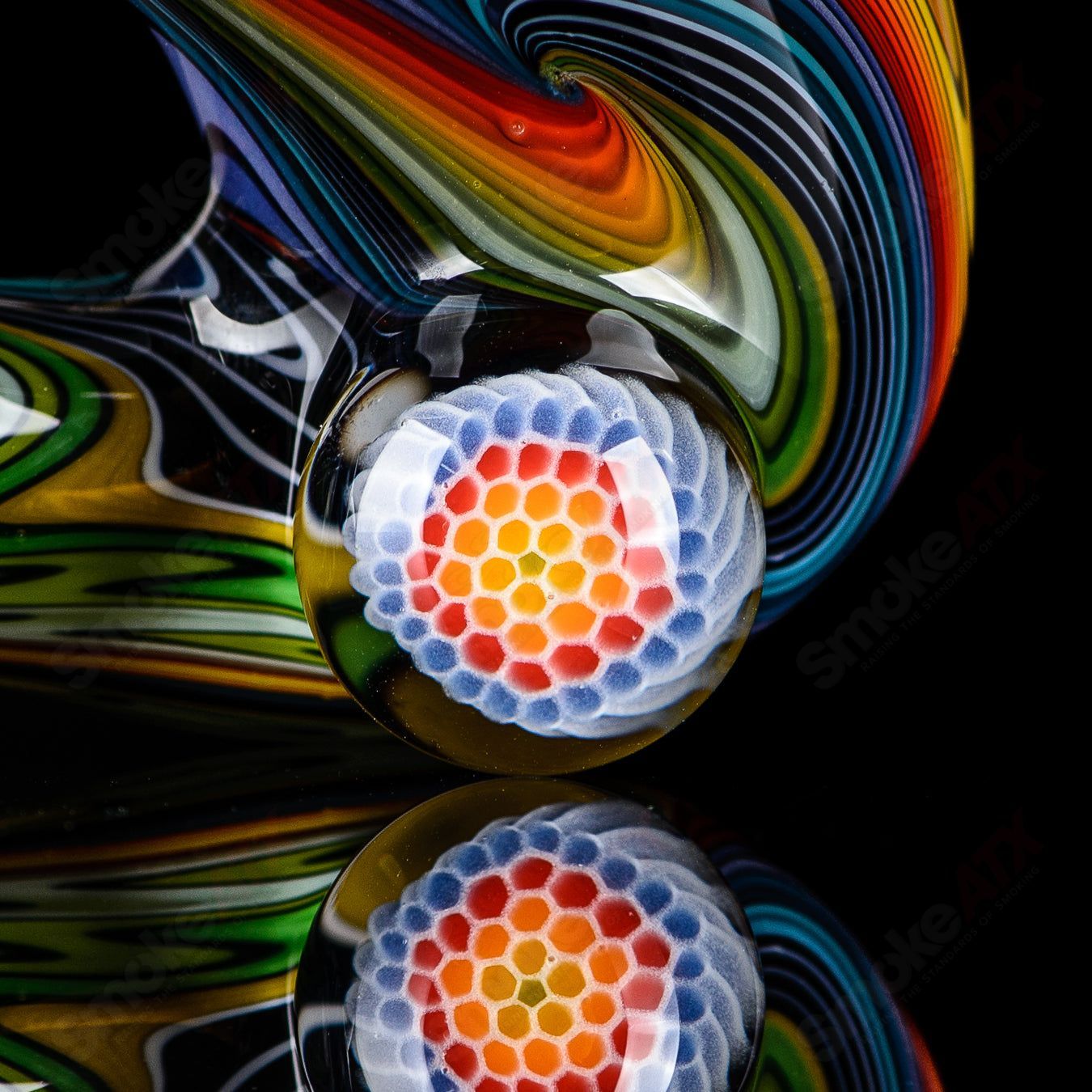 Small Wig Wag Sherlock heady glass pipe with Milli accent by JMass, featuring intricate glass design and vibrant colors.