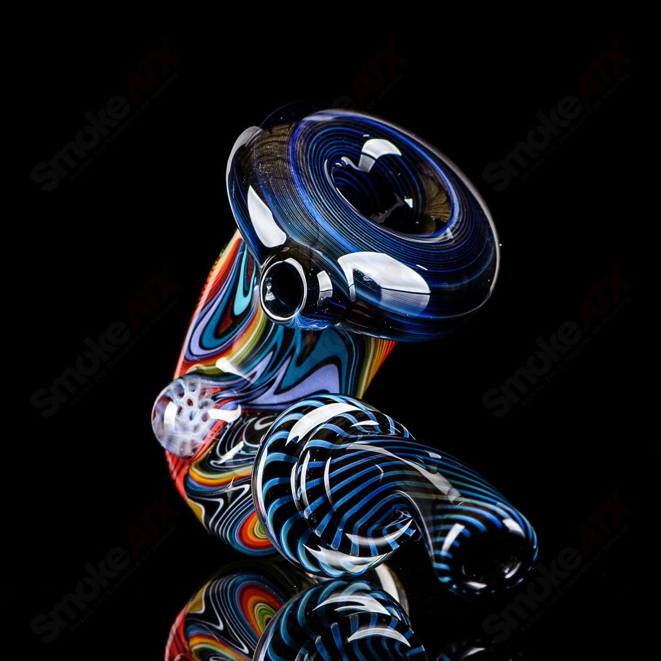 Small Wig Wag Sherlock heady glass pipe with Milli accent by JMass, featuring intricate swirl patterns and vibrant glasswork.
