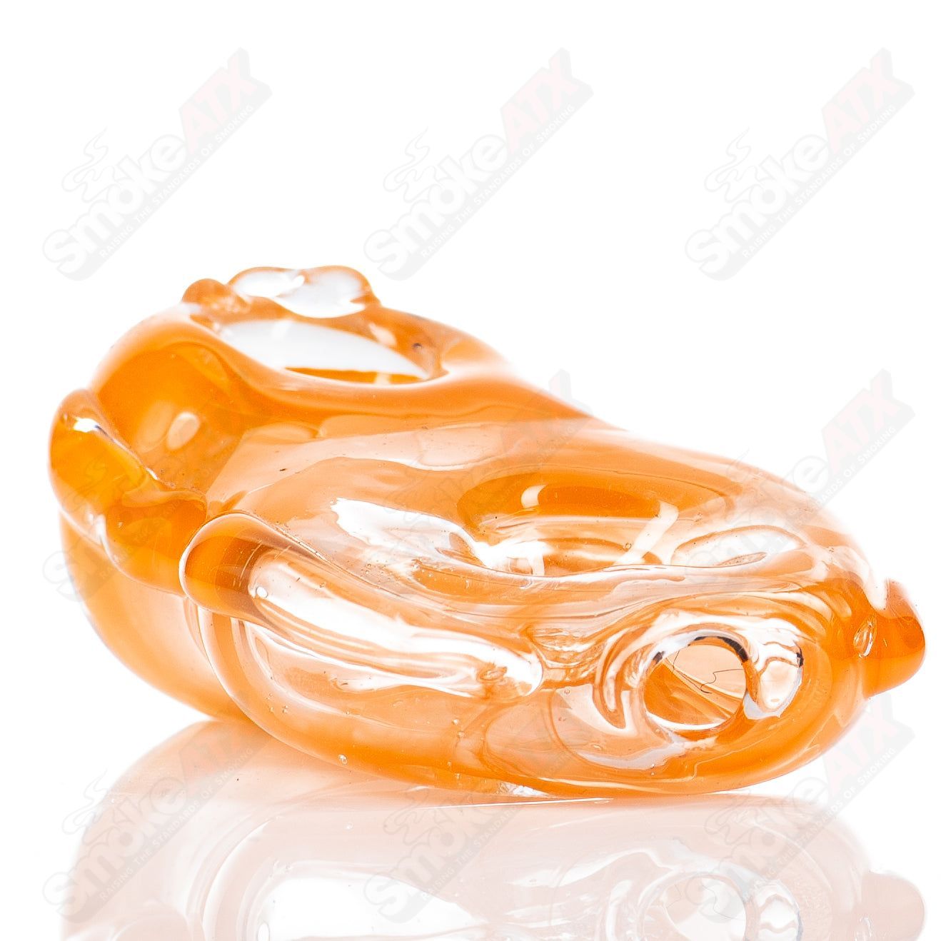 Glass pipe featuring a goddess design, crafted by Nobody, showcasing intricate details and smooth glass finish.