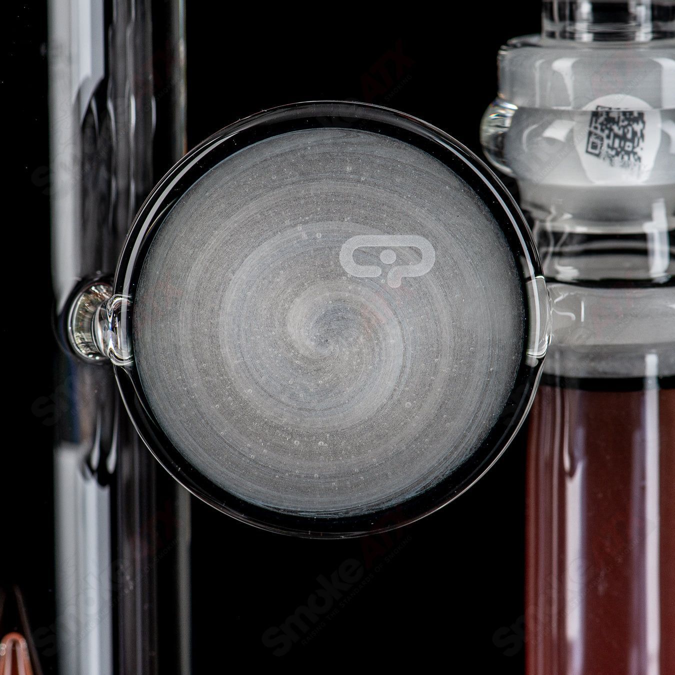 Mobius 45 T V1 Accent Waterpipe made of glass, featuring sleek design and intricate details visible in the image.