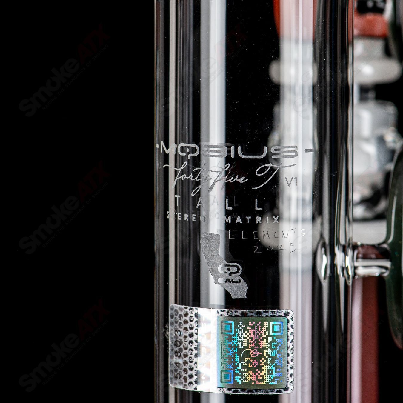 Mobius 45-T V1 Accent waterpipe glass piece with intricate design, featuring clear glass and artistic accents.