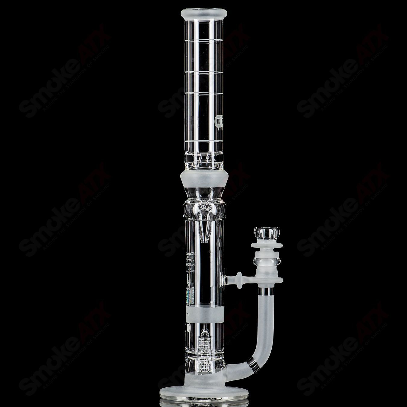 Mobius 45 T V1 Splash Trap glass waterpipe with coldworked design, clear glass with detailed features visible.