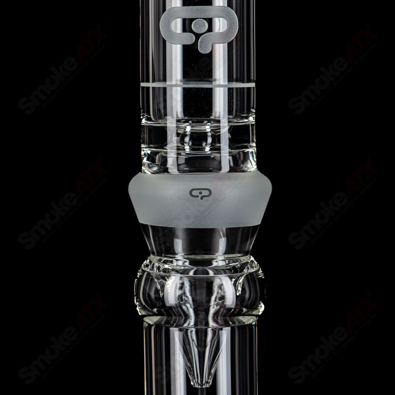 Glass Mobius 45 T V1 Splash Trap waterpipe with coldworked design, featuring a clear glass body and splash guard for smooth filtration.