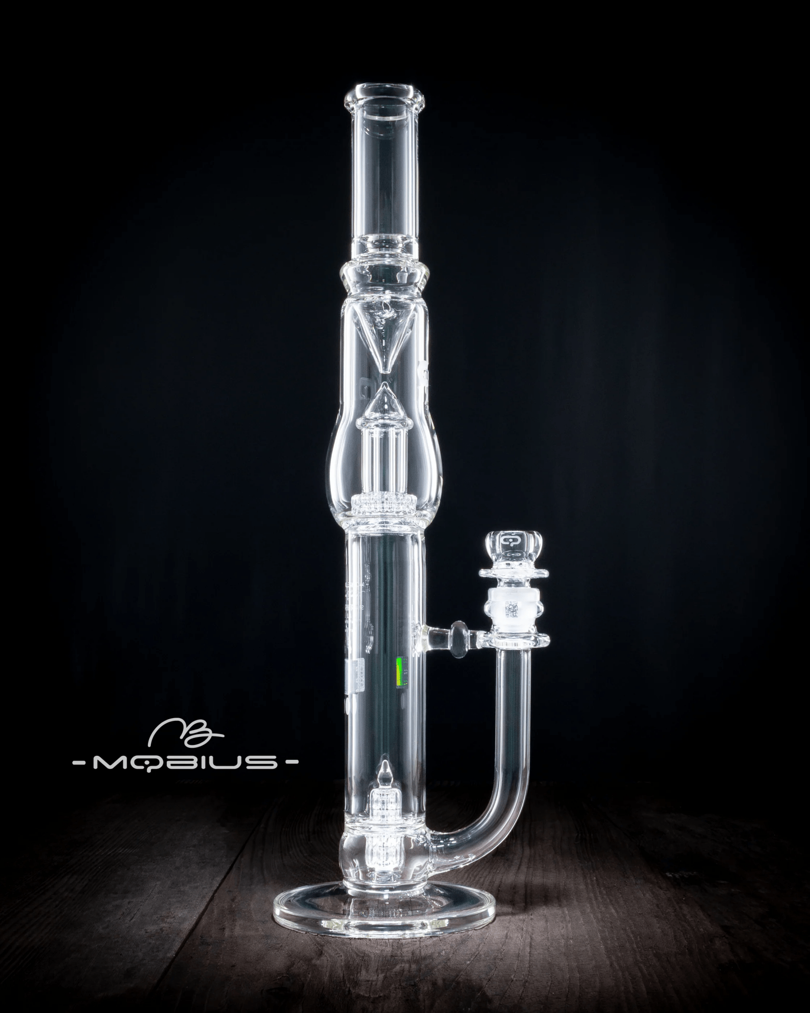 Mobius 45T Tall Stereo Matrix waterpipe with Splash Trap V1, featuring clear glass design and intricate water filtration details.