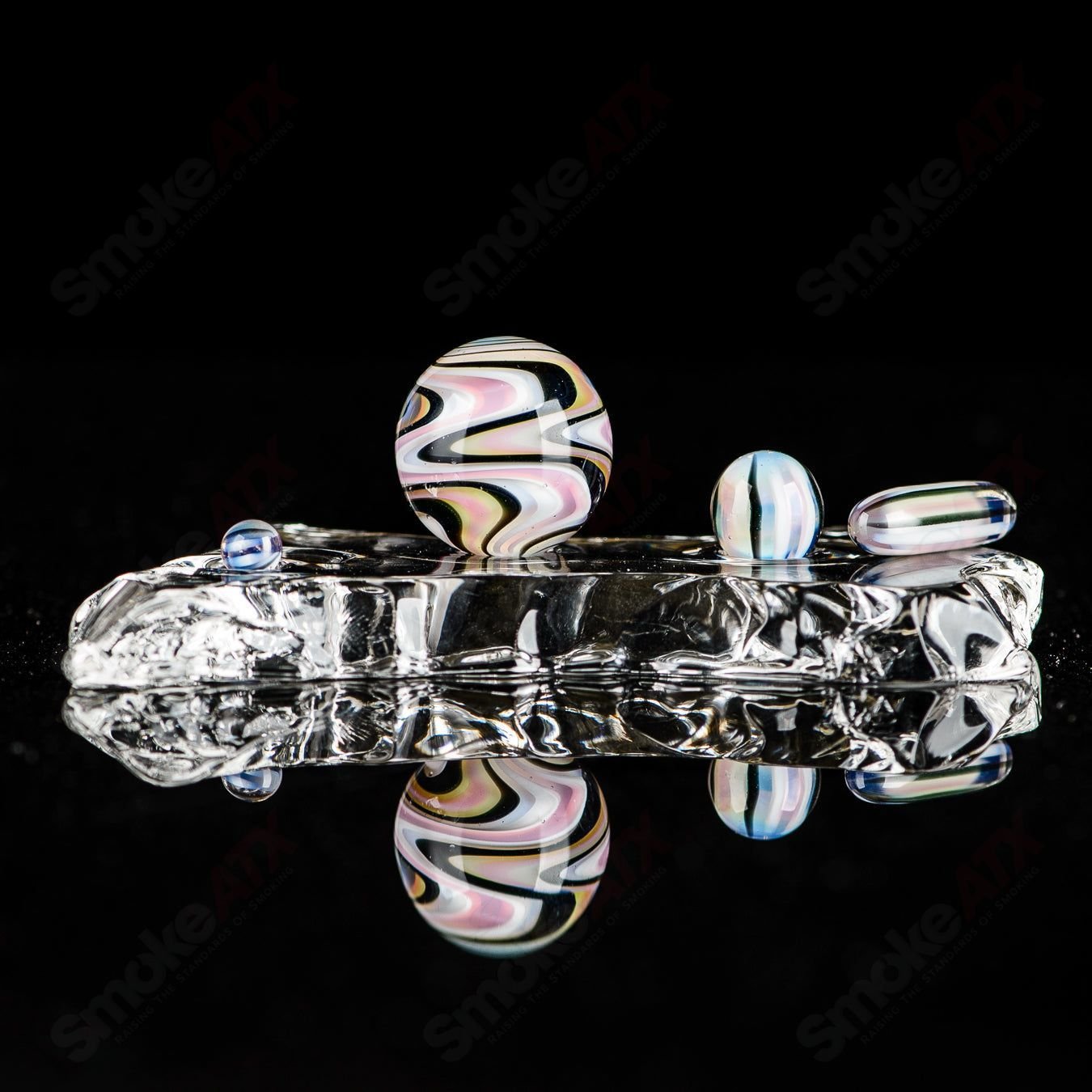 4-piece Indo Glass UV Slurper set featuring Ghost, Citrine, Lucy, Galaxy, and Karmaline glass accessories for dabbing.