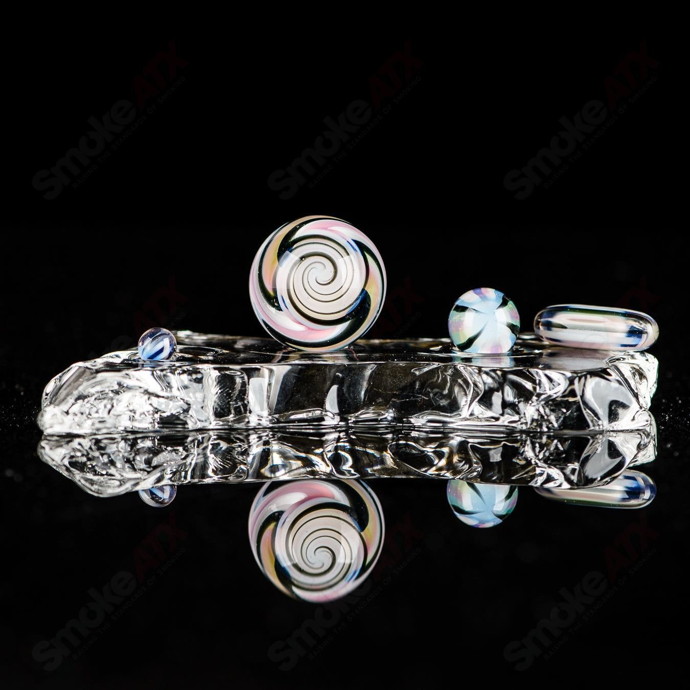 Four-piece UV glass slurper set including Ghost, Citrine, Lucy, Galaxy, and Karmaline designs by Indo Glass.