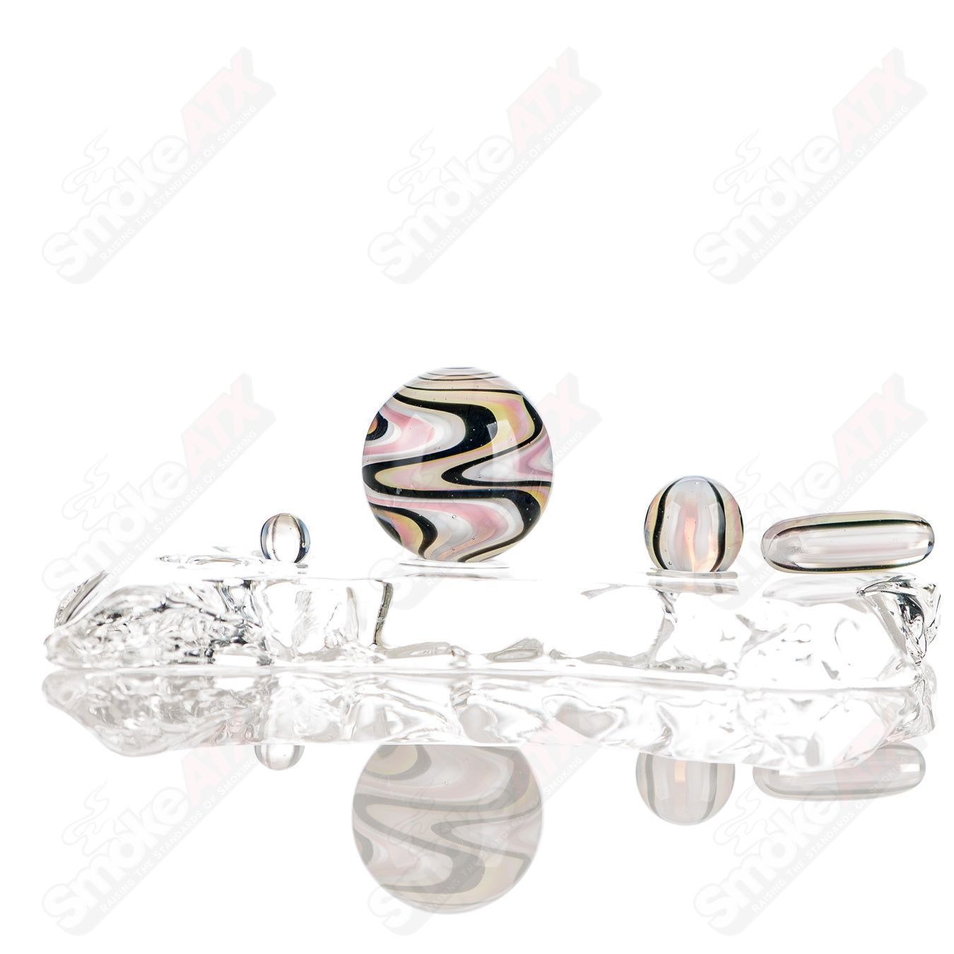 Set of four Indo Glass UV slurpers featuring Ghost, Citrine, Lucy, Galaxy, and Karmaline designs, made of glass accessories.
