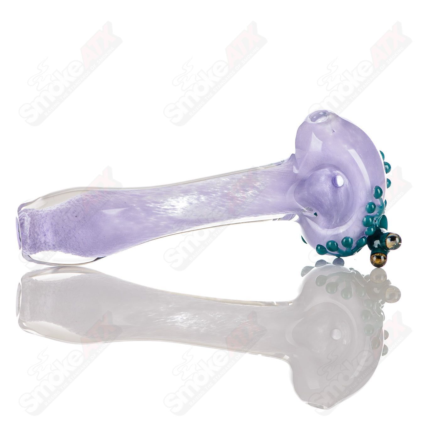 Beezy Glass #5 Frog Spoon Pipe with glass frog design, clear and colorful art, and a smooth, rounded shape for easy handling.