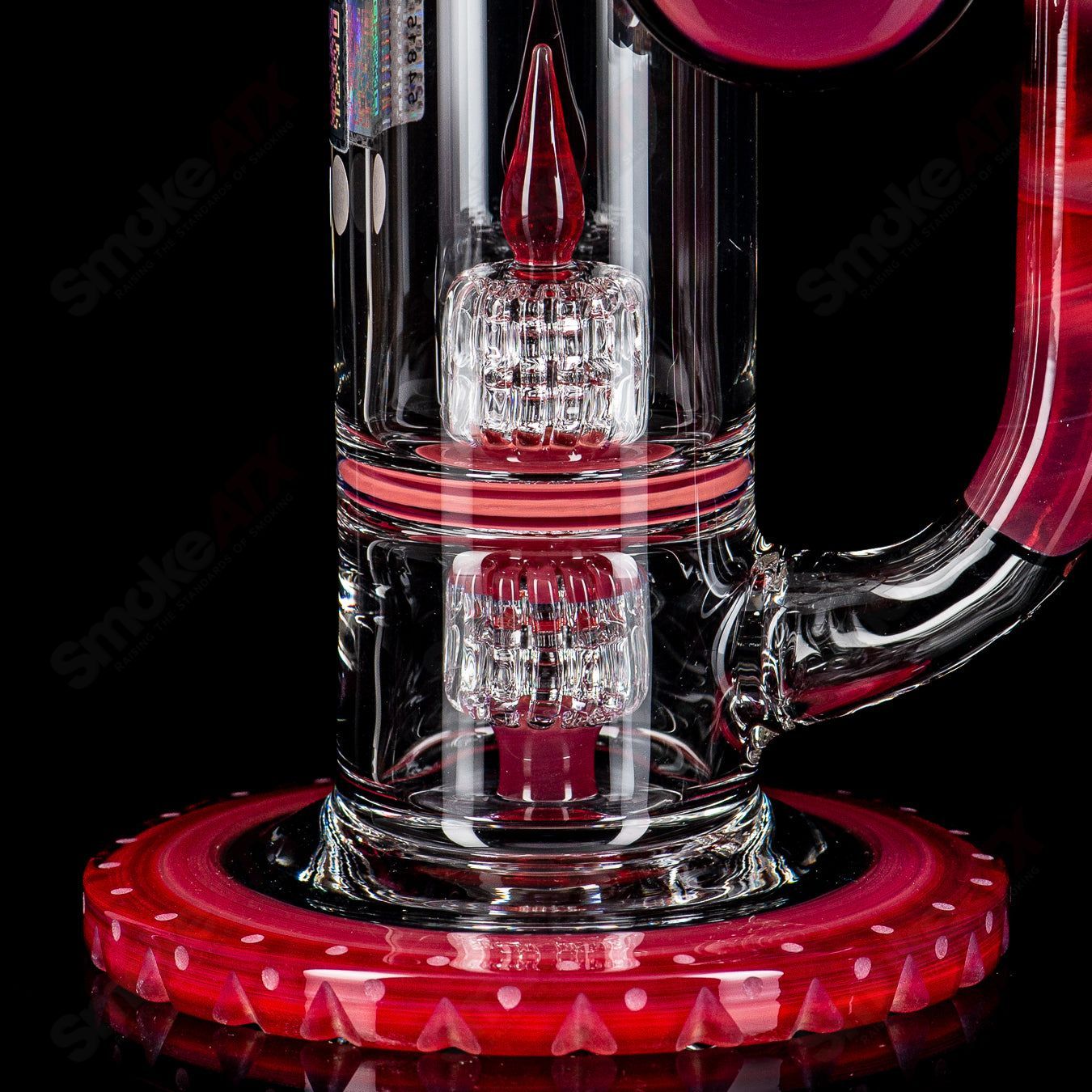 Mobius 50T V6 Hybrid 2025 glass waterpipe with intricate design and clear glass body showcasing its water chamber and mouthpiece.