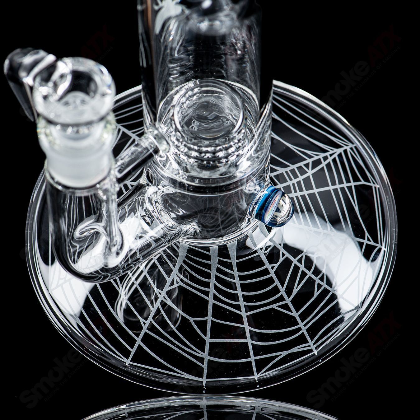 Clear 50x5 grid cap glass straight tube with Millie and Halloween patterns by Sovereignty Glass.