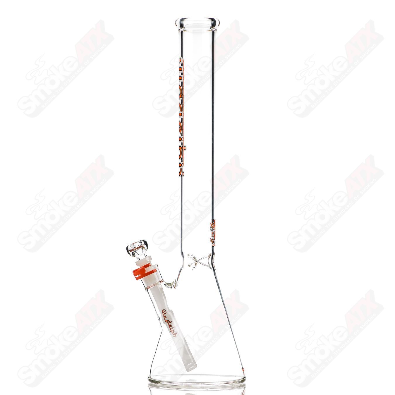 Orange medium glass beaker by Illadelph, 5mm thickness, with clear measurement markings and a sturdy base.