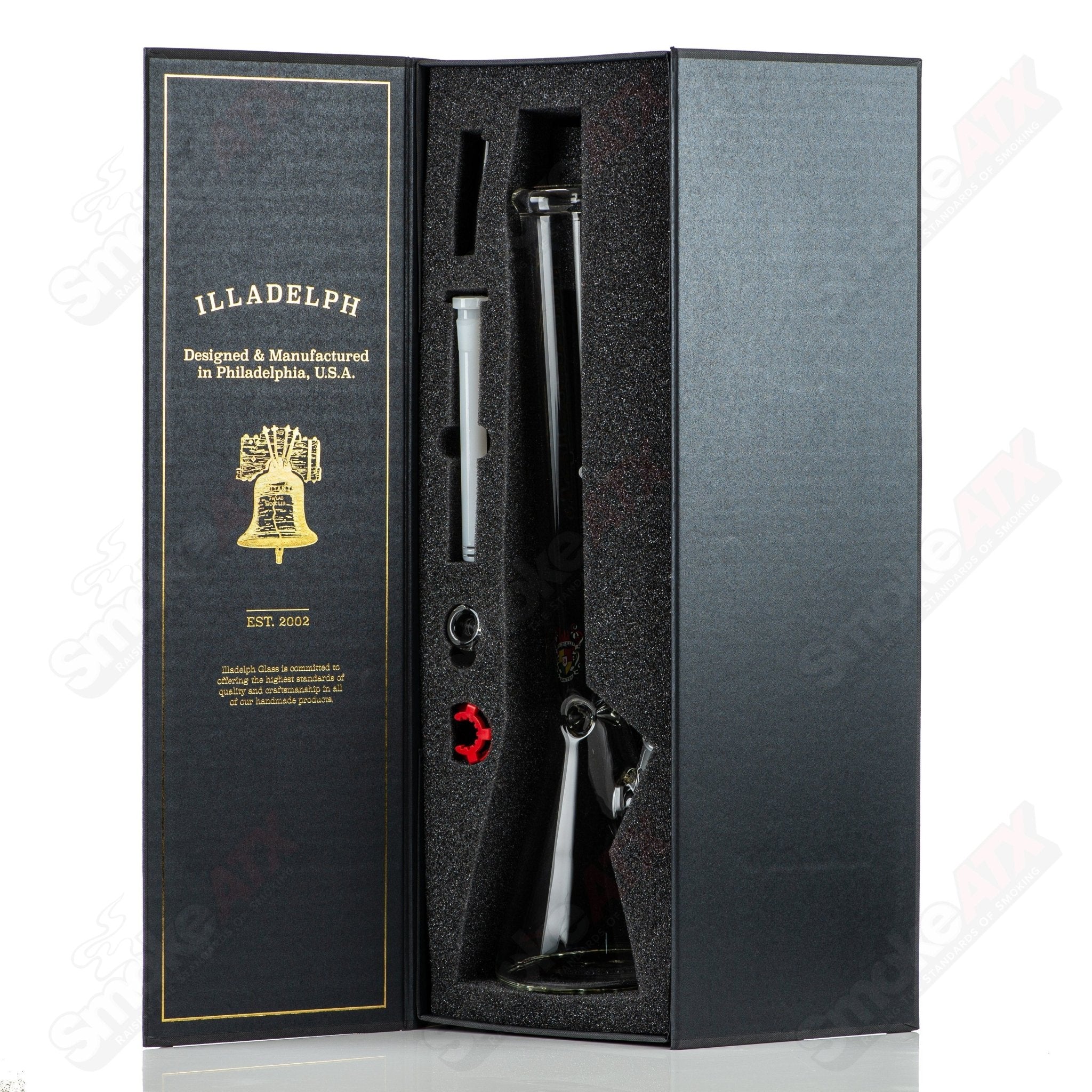Illadelph 5mm Rasta Medium Beaker glass water pipe with colorful Rasta design and sturdy beaker shape.