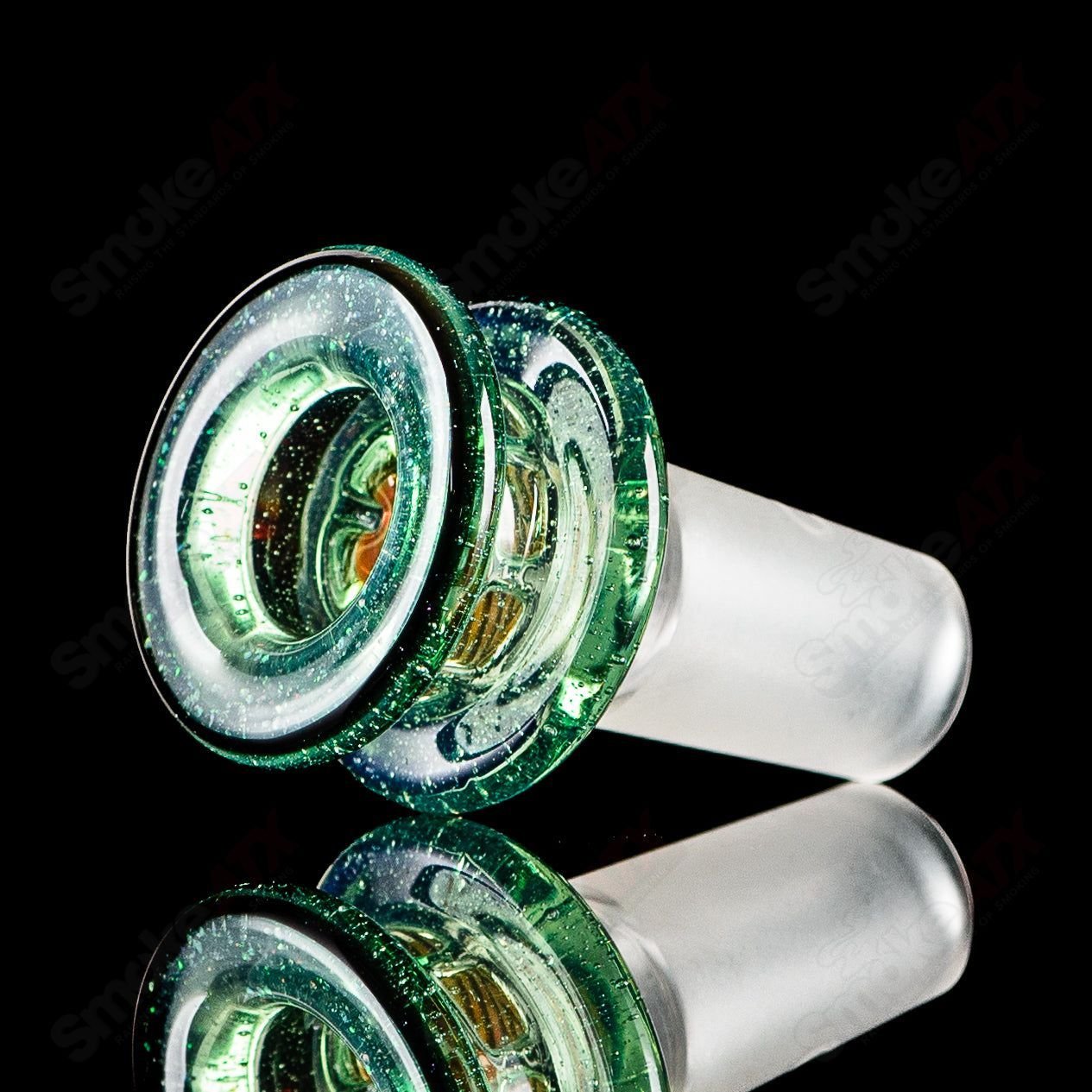 Mobius Heady Glass 19mm UV Color Elements Multi-Hole Bowl featuring vibrant UV-reactive colors and multiple holes for airflow.