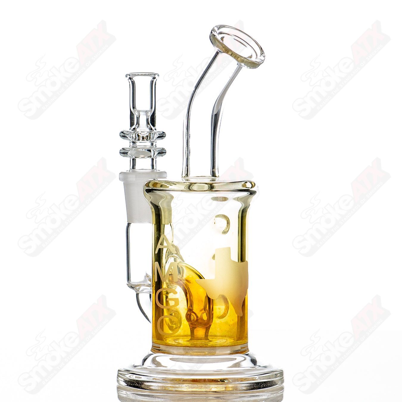 Gold fumed 6-inch 44mm glass shredder rig for concentrates by Austin Made Glass Co, featuring intricate glasswork and a sturdy design.
