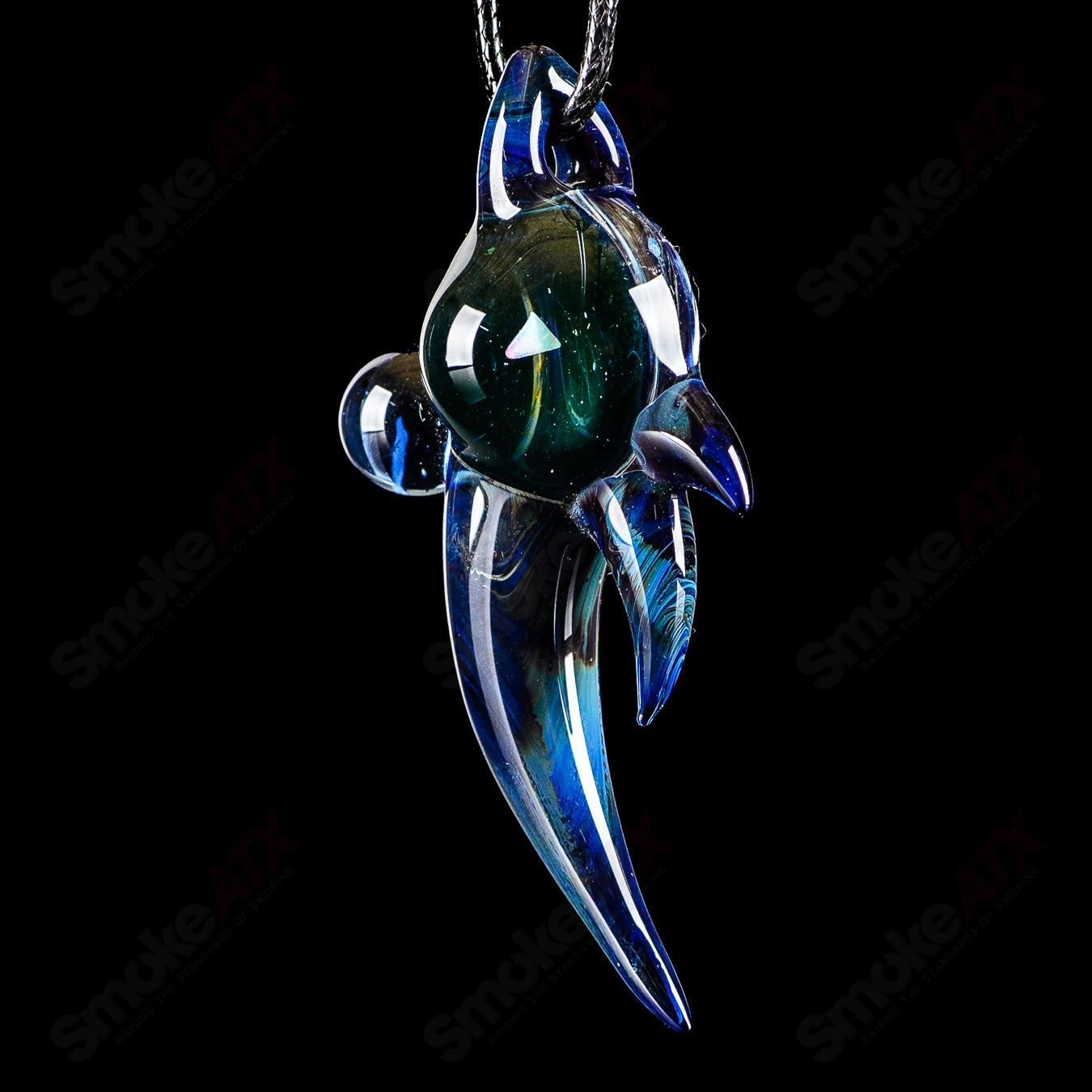 Dosh Glass #6 Amulet Pendant Heady Glass jewelry featuring a colorful, artistic glass pendant with intricate design details.