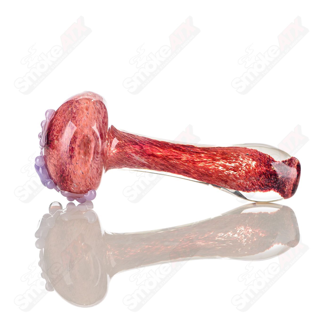 Beezy Glass #6 Frog Spoon pipe made of clear glass with a frog-shaped bowl and smooth, curved design.