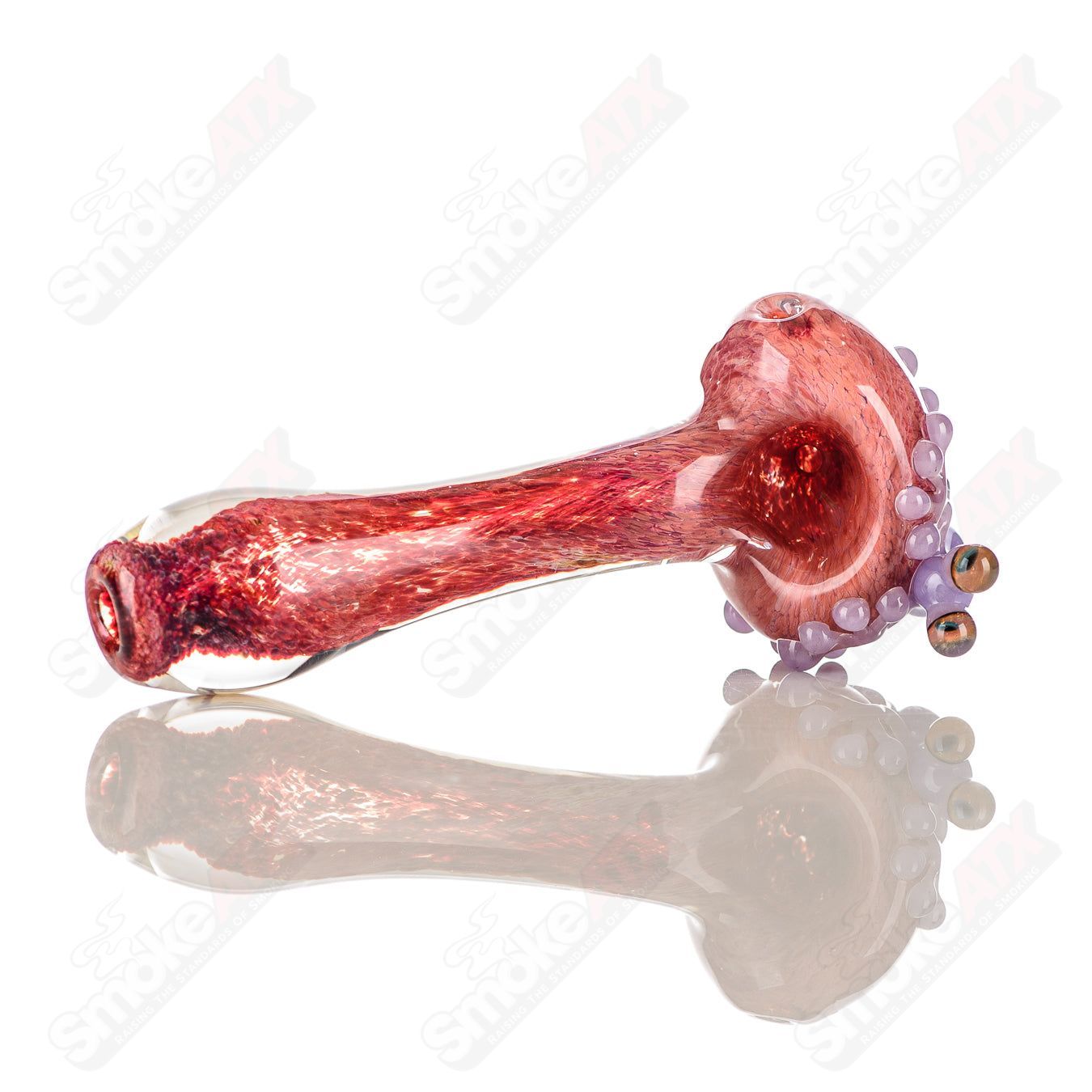 Beezy Glass #6 Frog Spoon glass pipe with a colorful frog design, showcasing smooth glass craftsmanship and intricate detailing.