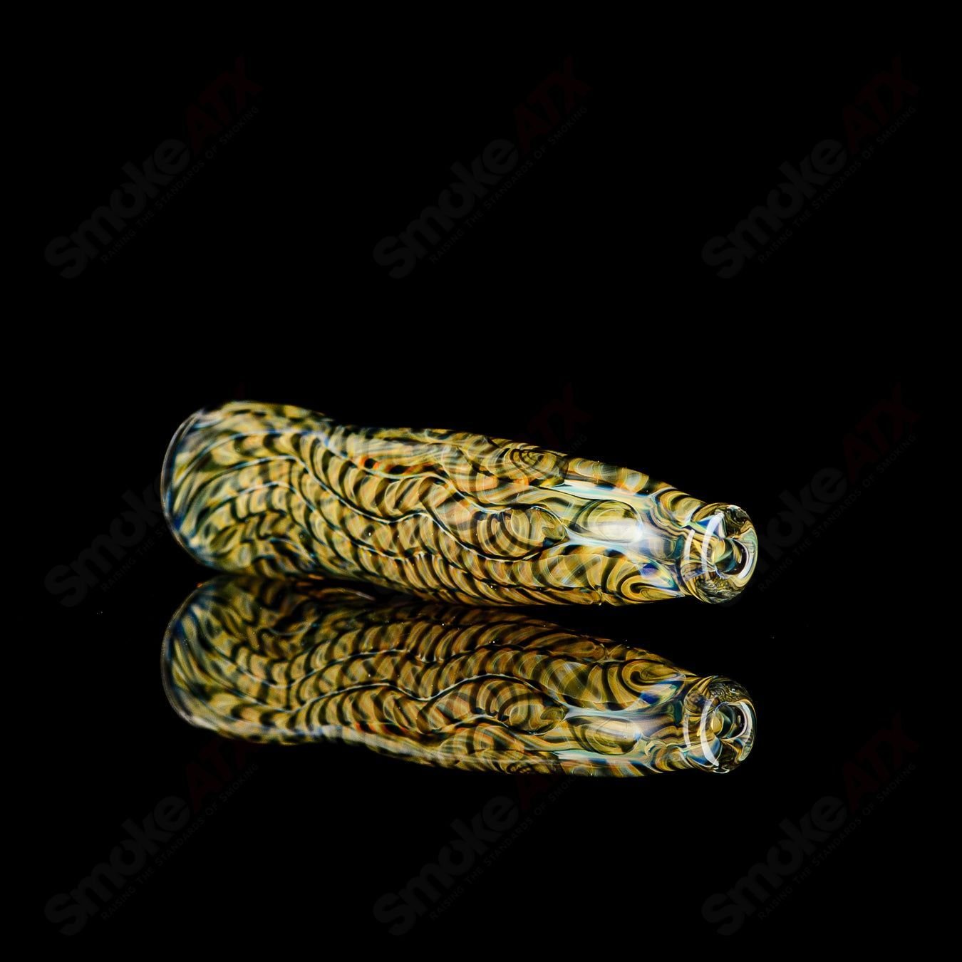 Signed JMK Glass #6 I/O Worked Chillum, clear glass smoking pipe with intricate worked design and signature detail.
