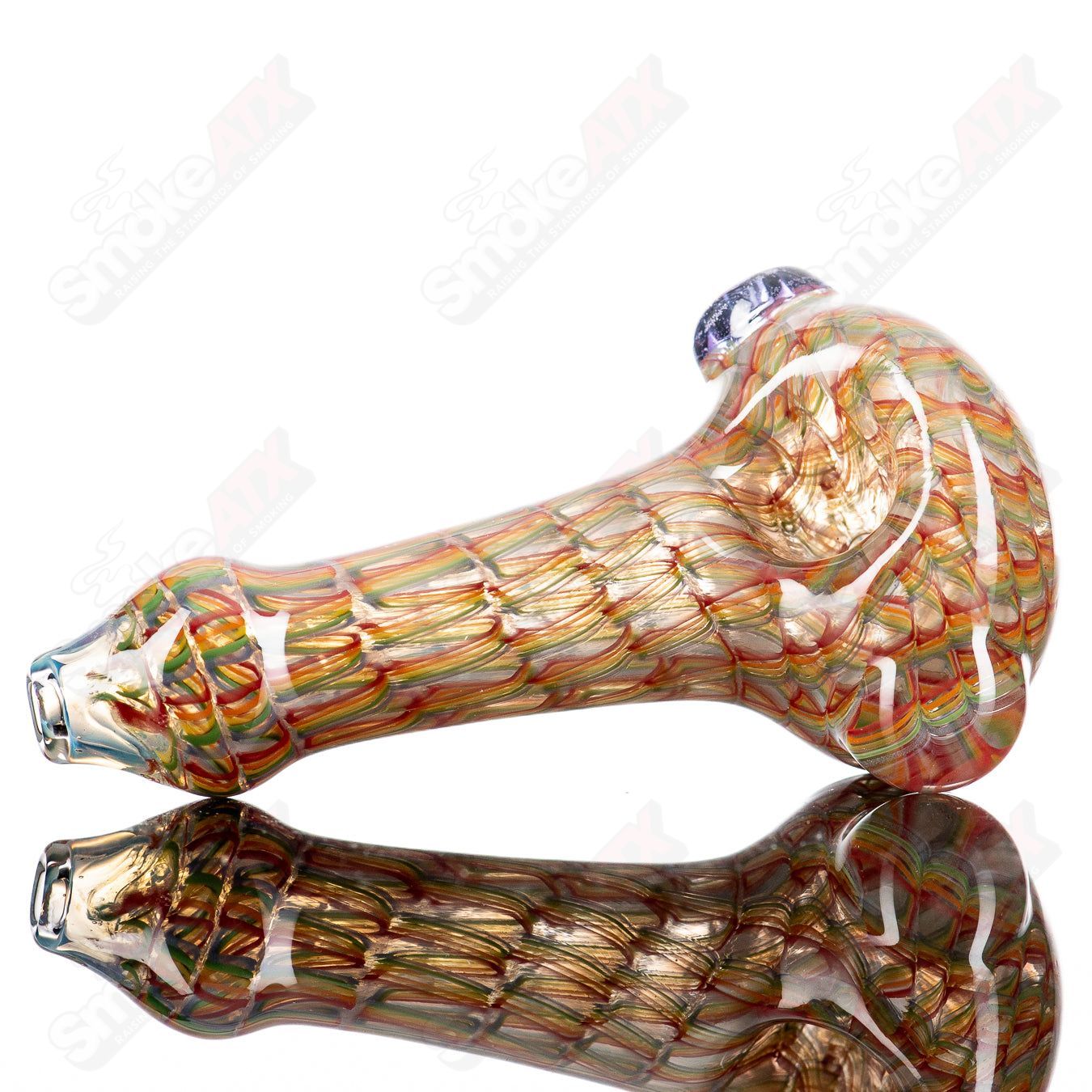 JMK Glass #6 Lattice Coil Spoon hand pipe featuring a detailed lattice coil design in clear and colored glass.