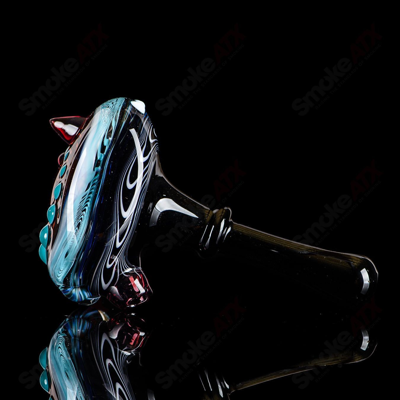 Six-piece spoon hand pipe set by JMass featuring black mouthpieces and colorful glass accents.
