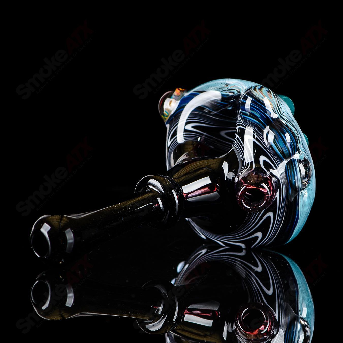 Six-piece set of JMass heady glass spoons with black mouthpieces, featuring clear glass bowls and intricate designs.