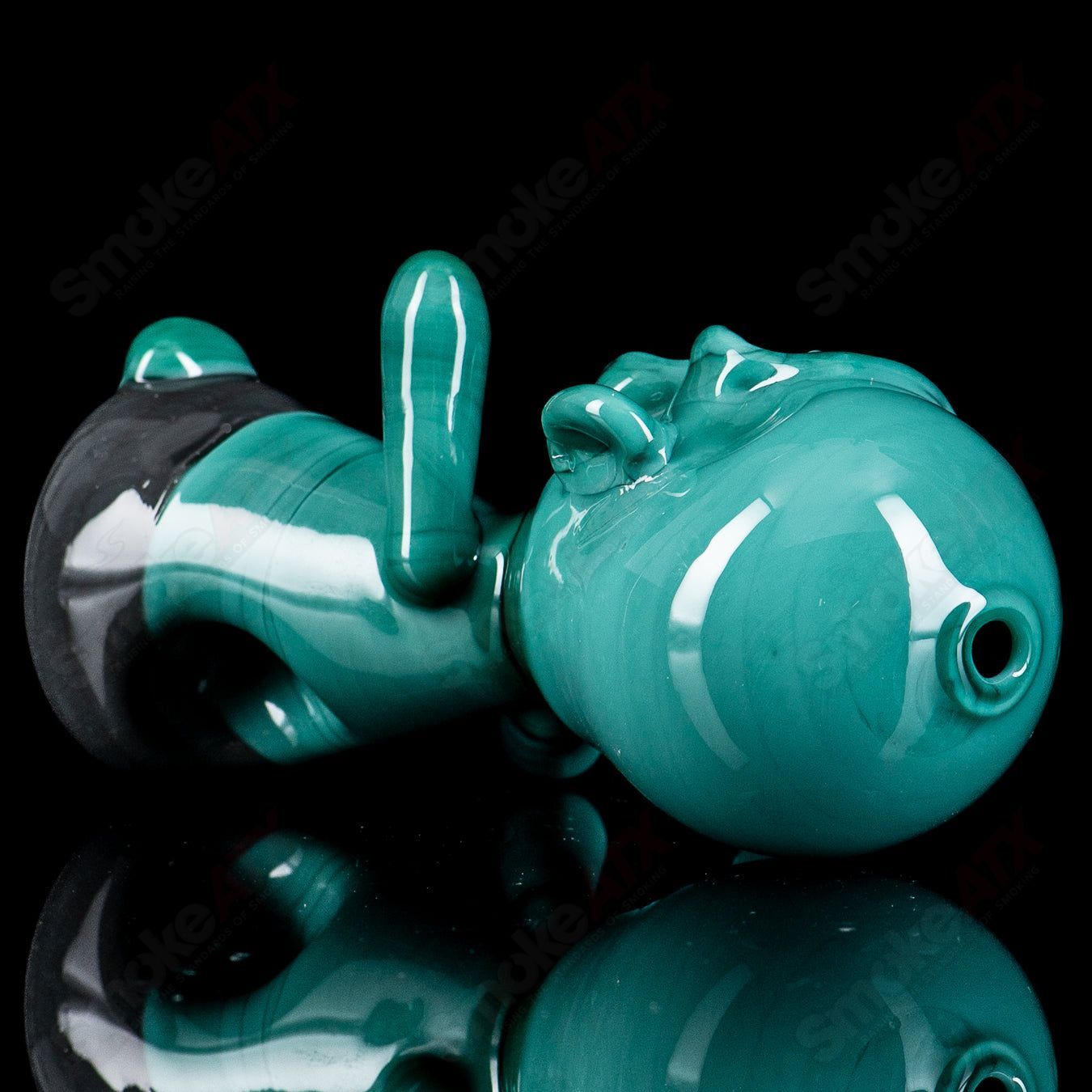 Ghost Heady Glass Zombie Hand Pipe featuring a detailed zombie hand design for smoking.