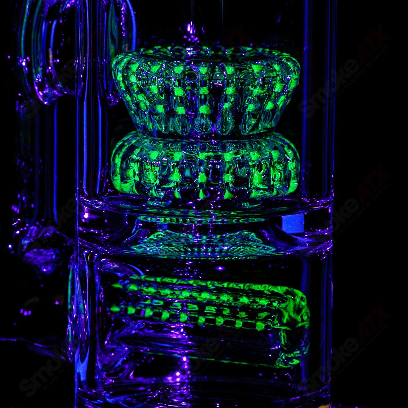 60mm UV Horizonline Crown Perc Tube by Rawlins Glass, clear straight glass heady bong with vibrant UV-reactive design.