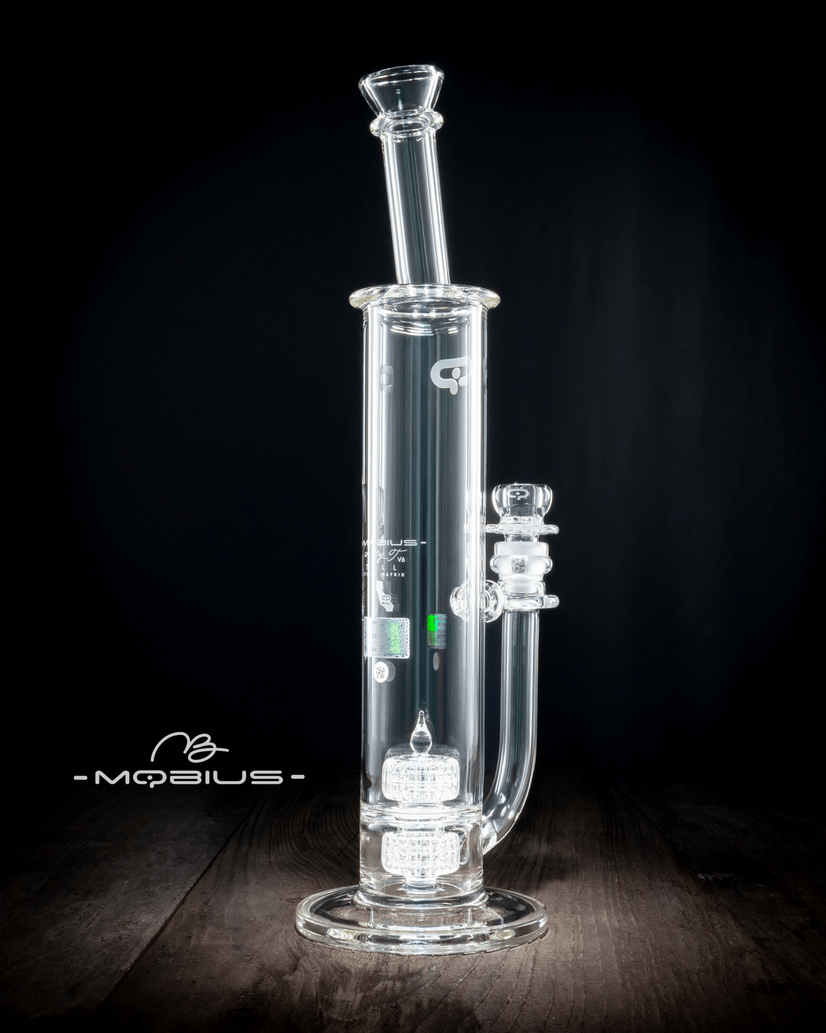 Clear Mobius 60T Tall Stereo Matrix V6 glass waterpipe with intricate design and sturdy build, perfect for smooth smoking experiences.