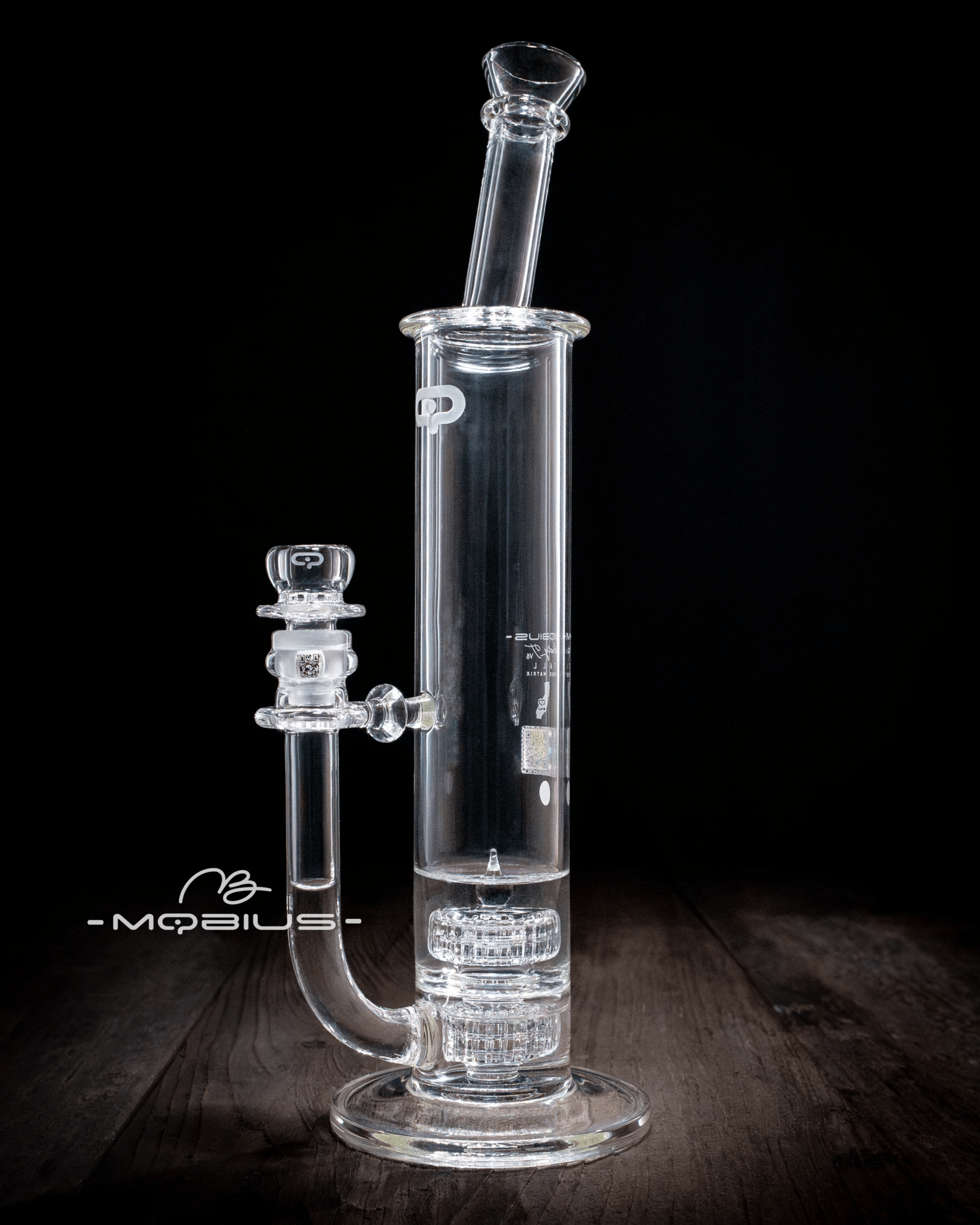 Clear Mobius 60T Tall Stereo Matrix V6 glass waterpipe with intricate design and durable construction for smooth smoking experience.