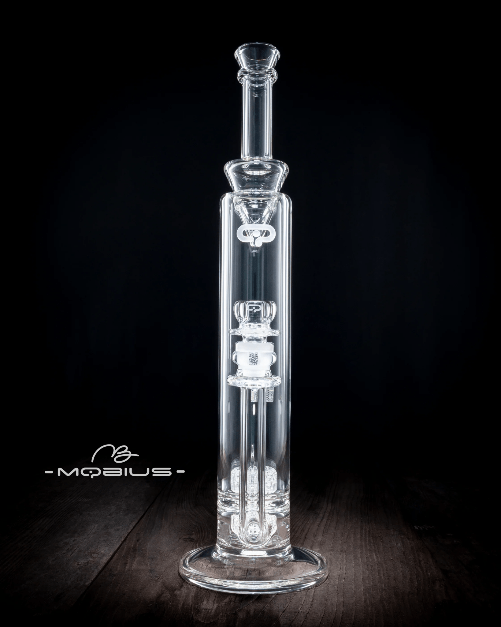 Clear Mobius 60T Tall Stereo Matrix waterpipe with Splash Trap V6, featuring intricate glass design and durable construction.