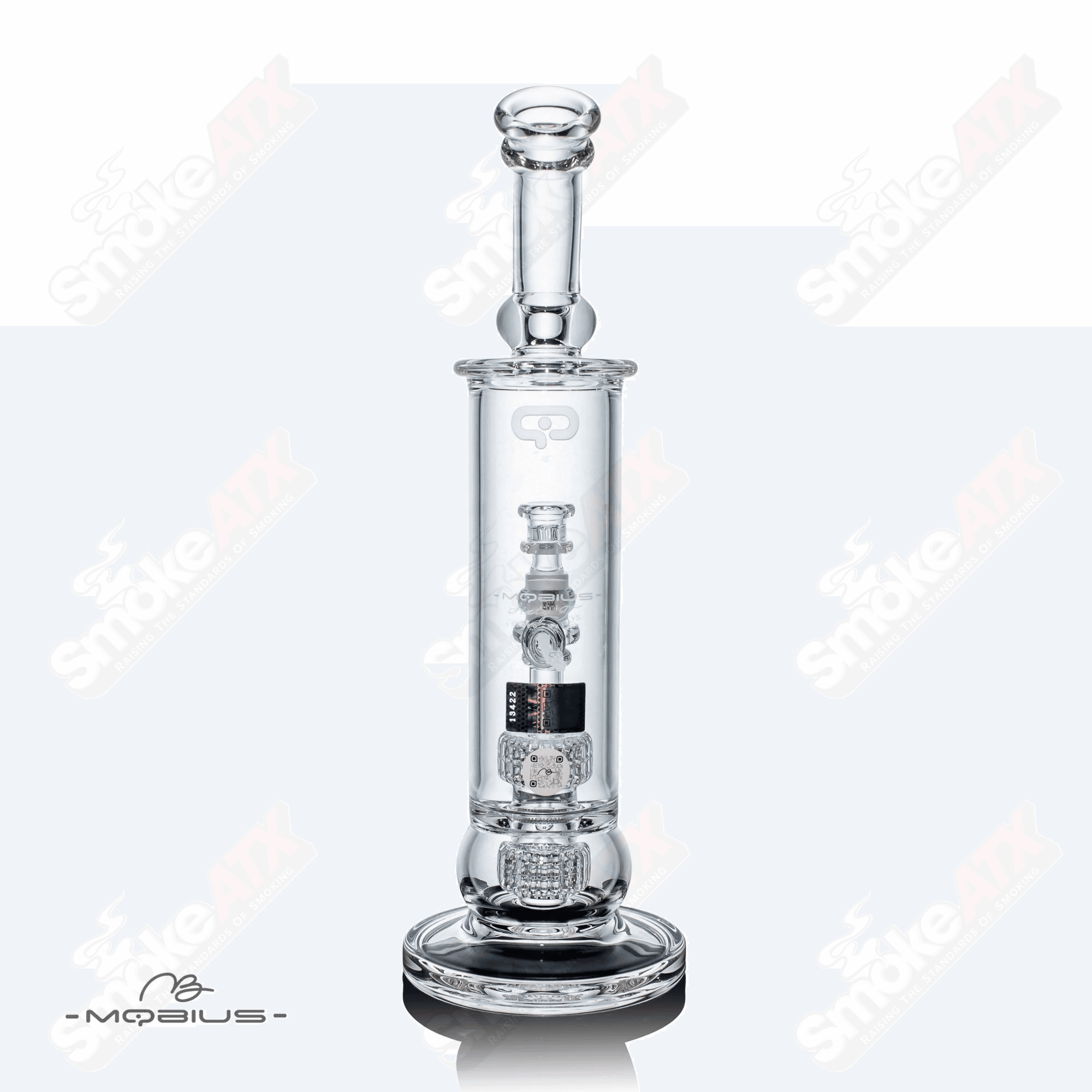 Mobius 60T V5 Stereo Matrix glass waterpipe with intricate design and clear glass construction for smooth smoking experience.