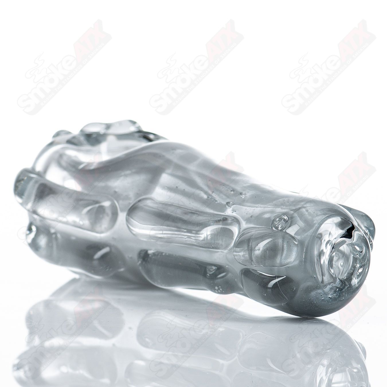 Glass pipe called Spoon Glass by Nobody, featuring a clear, smooth glass design with a rounded bowl and straight stem.