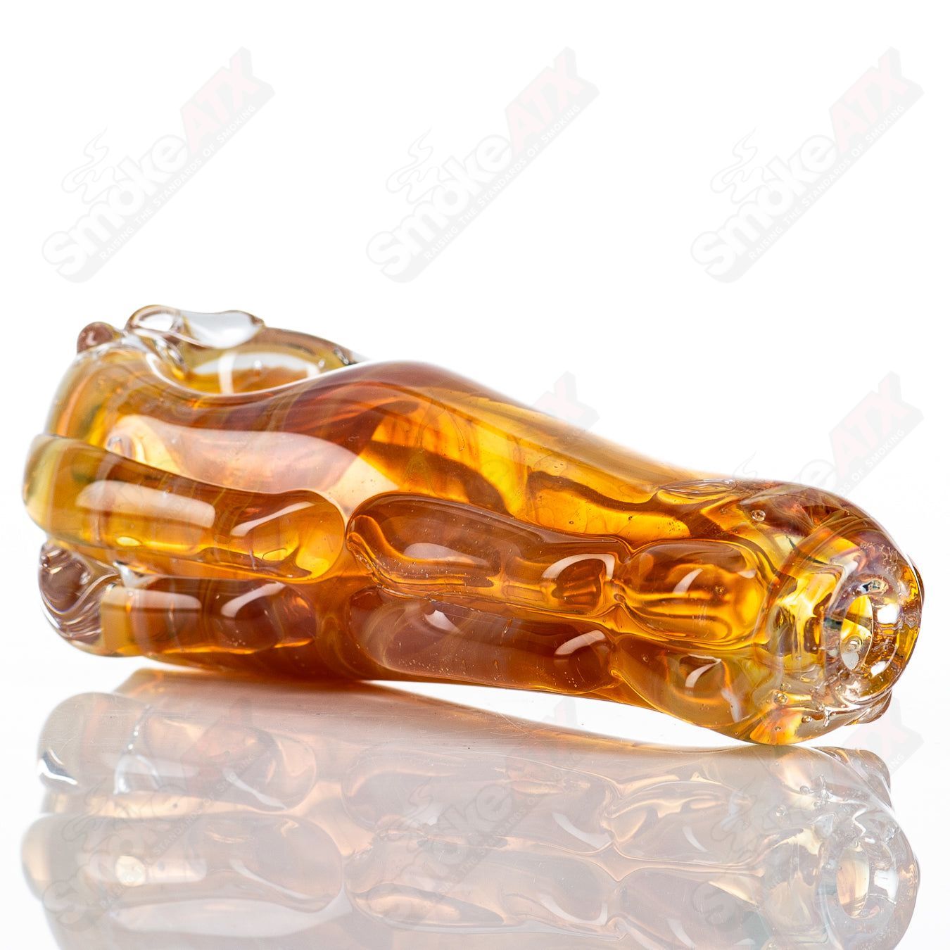 Glass pipe called the #63 Spoon Glass by Nobody, clear glass with a smooth, rounded bowl and slender stem for smoking.