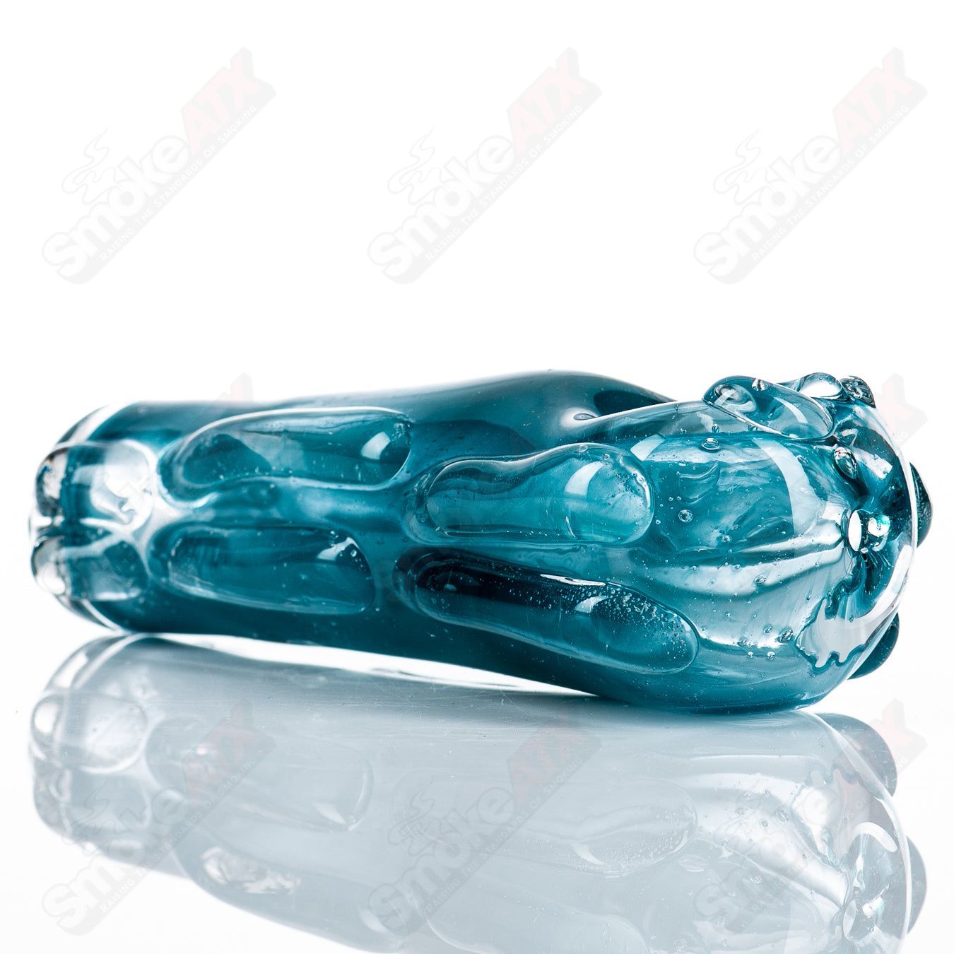 Glass pipe called #66 Spoon Glass by Nobody, featuring a smooth, rounded bowl and clear glass construction.