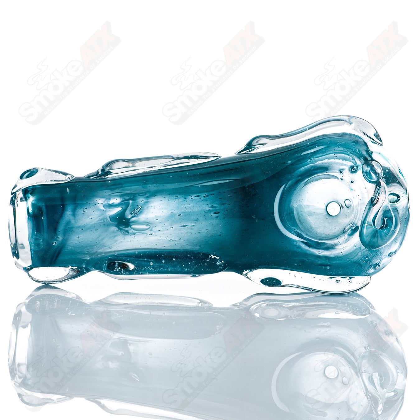 Glass pipe named #66 Spoon Glass by Nobody, featuring a clear glass design with a rounded bowl and smooth mouthpiece.