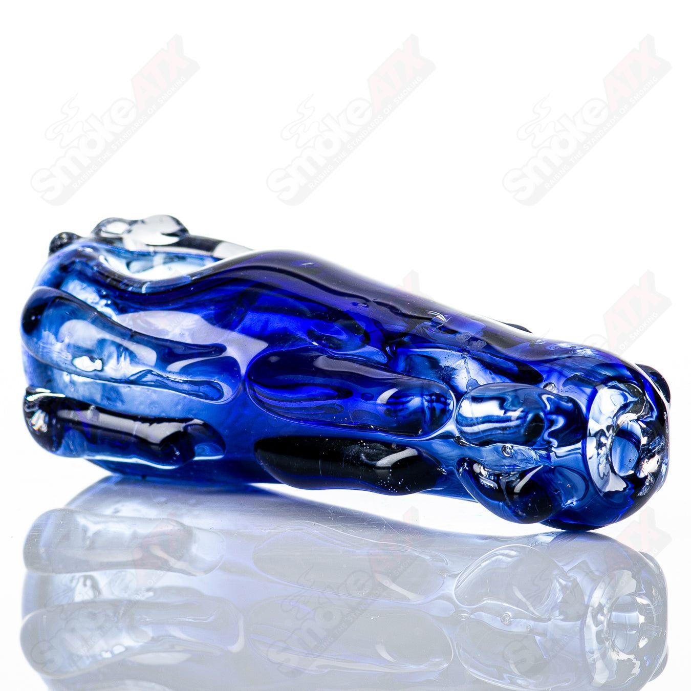 Clear glass spoon pipe by Nobody featuring a smooth, rounded bowl and sleek design for smoking or vaporizing.