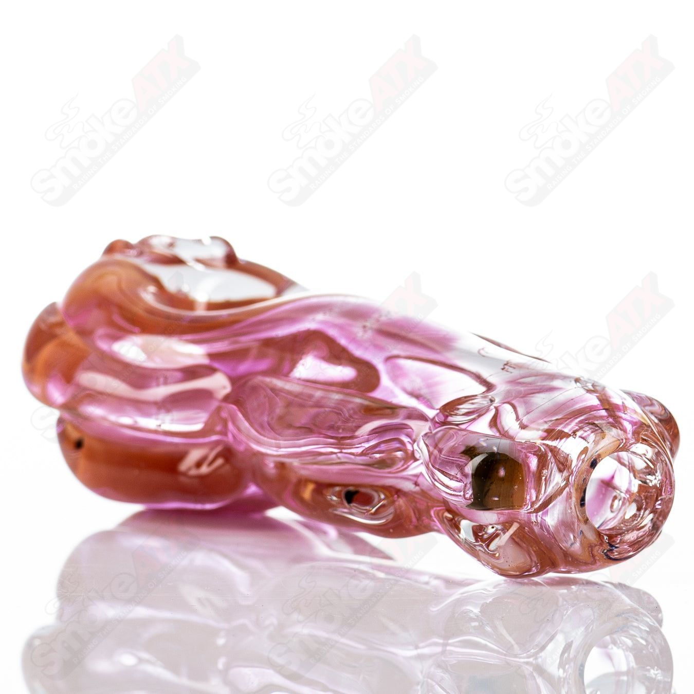 Glass pipe featuring a 69 spoon shape by Nobody, with clear glass and smooth curved design for smoking or display.