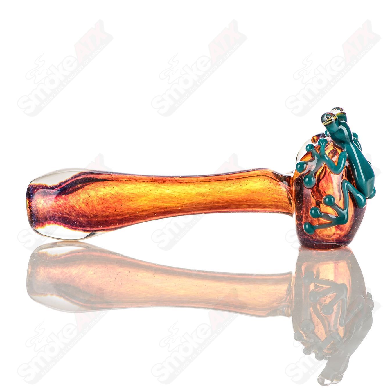 Beezy Glass #7 Frog Spoon pipe made of clear glass with a frog design, featuring a rounded bowl and curved mouthpiece.