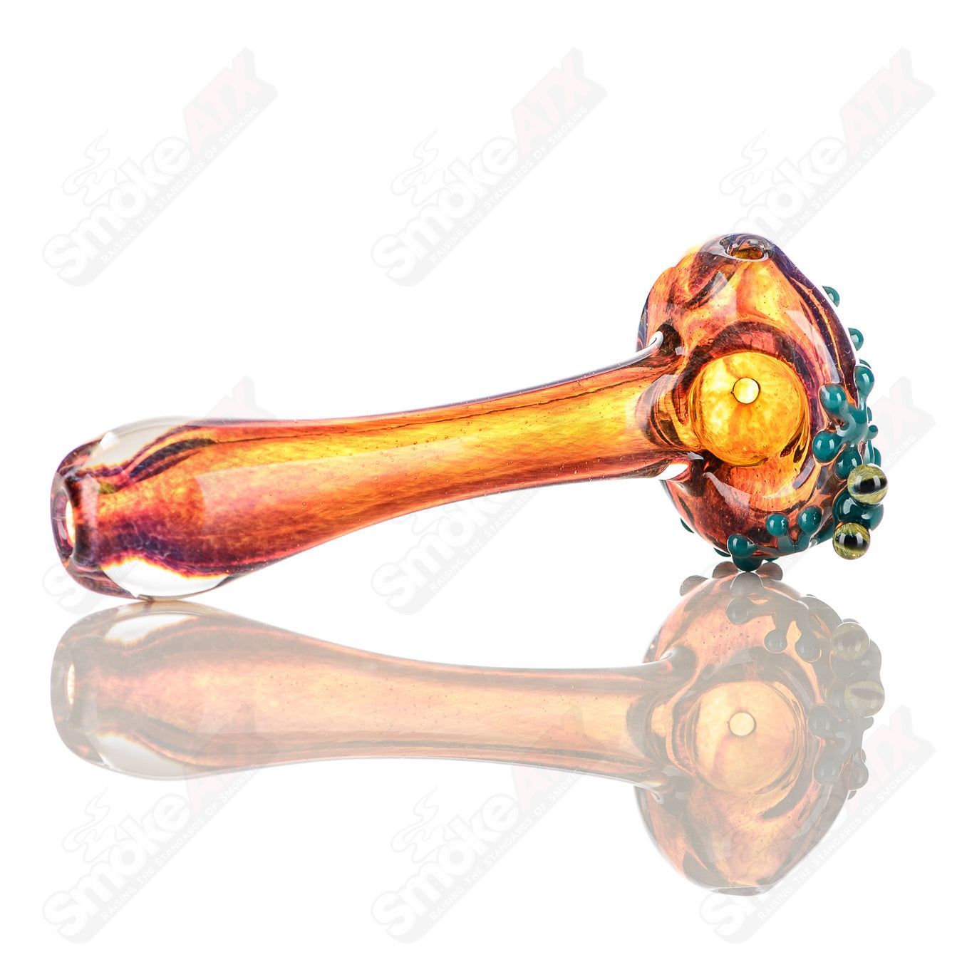 Beezy Glass Frog Spoon Pipe made of clear glass, featuring a detailed frog design and a comfortable mouthpiece.