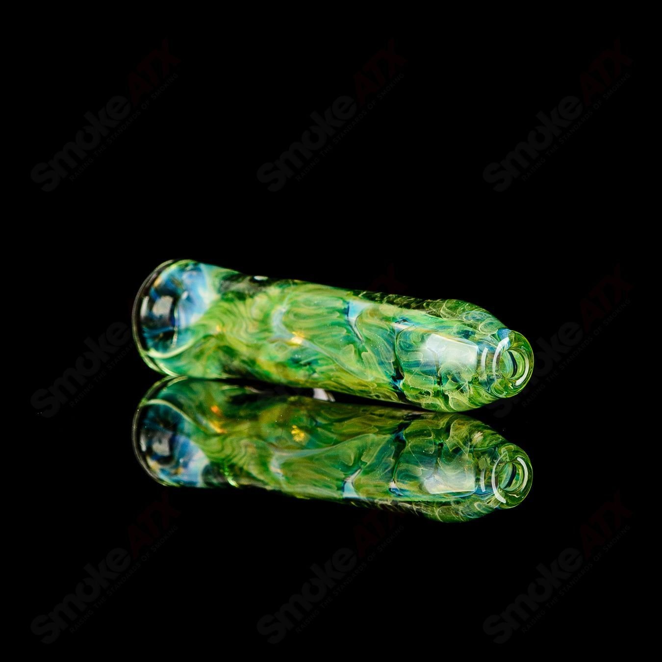JMK Glass signed #7 I/O Worked Chillum featuring intricate glasswork, clear glass body, and detailed craftsmanship.