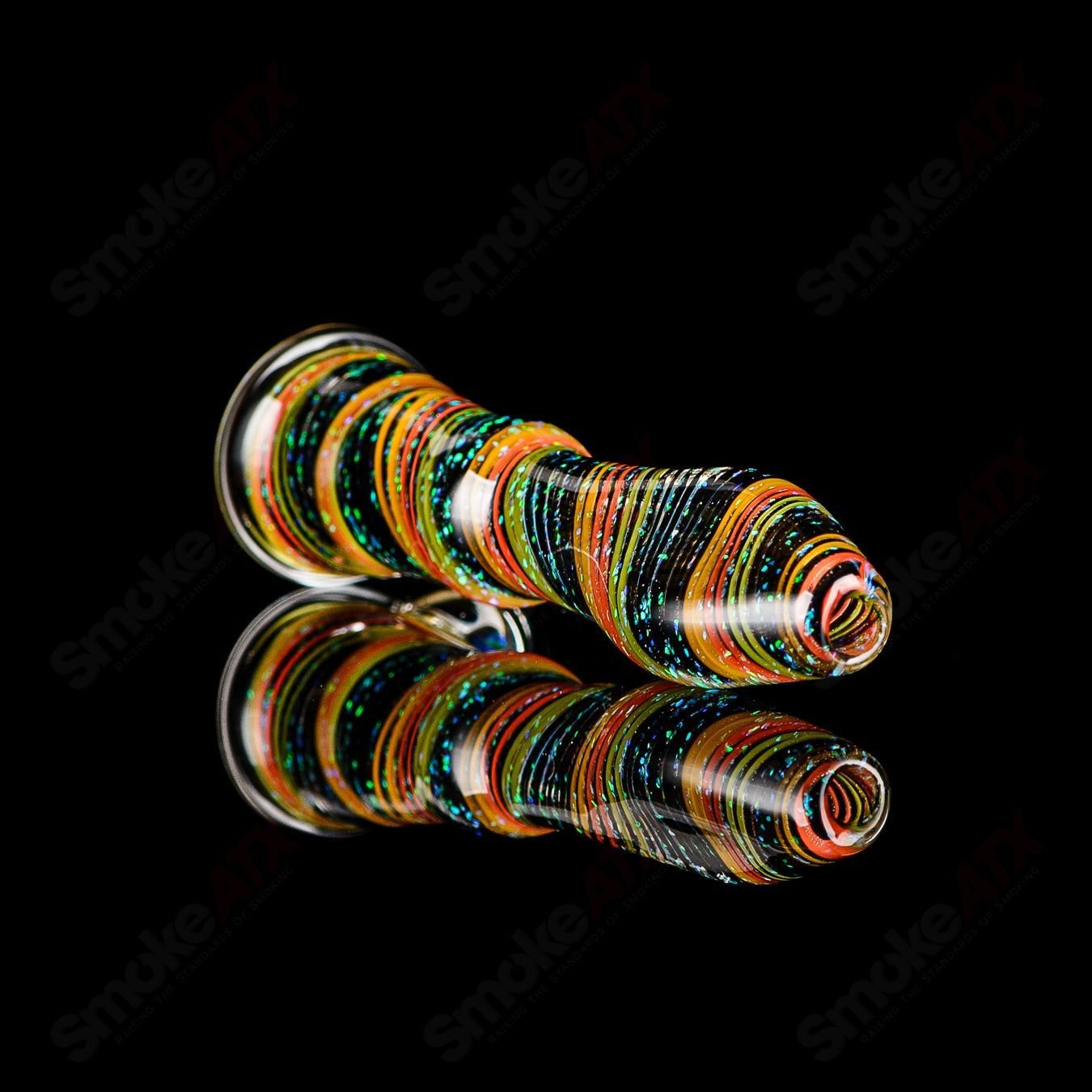 Glass chillum called Opal Hitter by Rotational Science featuring a colorful opal design and smooth glass construction.