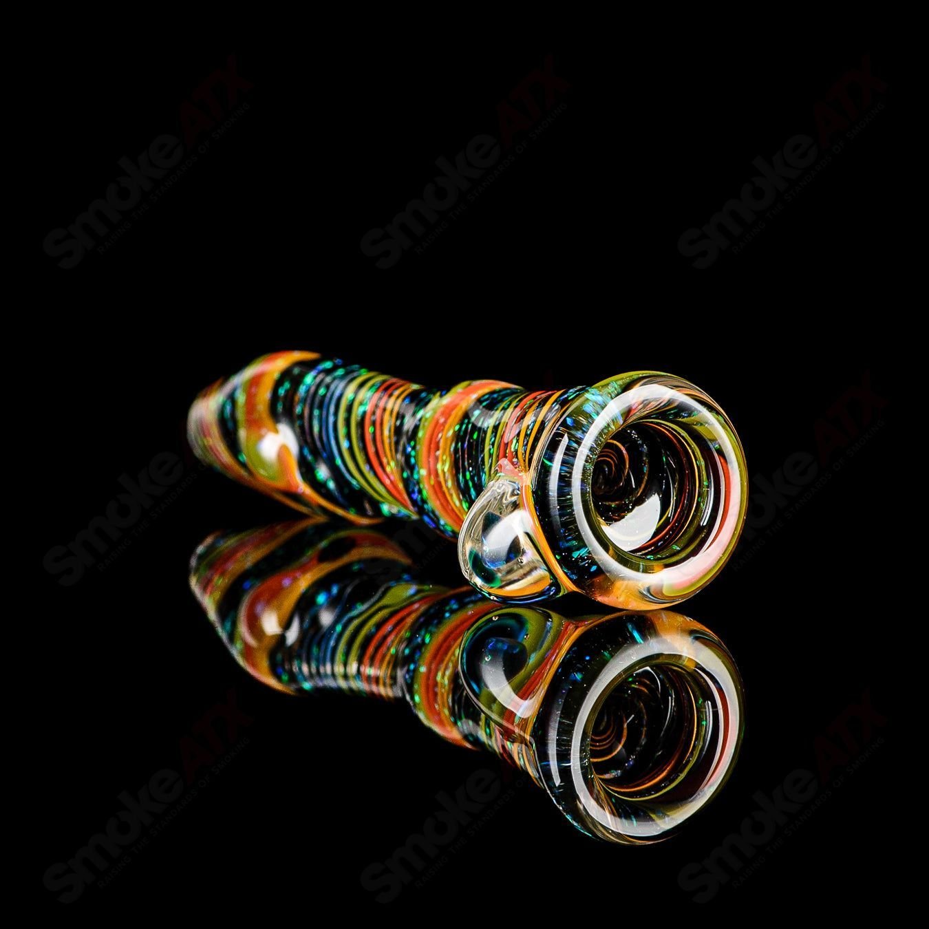 Glass chillum named #7 Opal Hitter by Rotational Science, featuring a colorful opal design and smooth cylindrical shape.