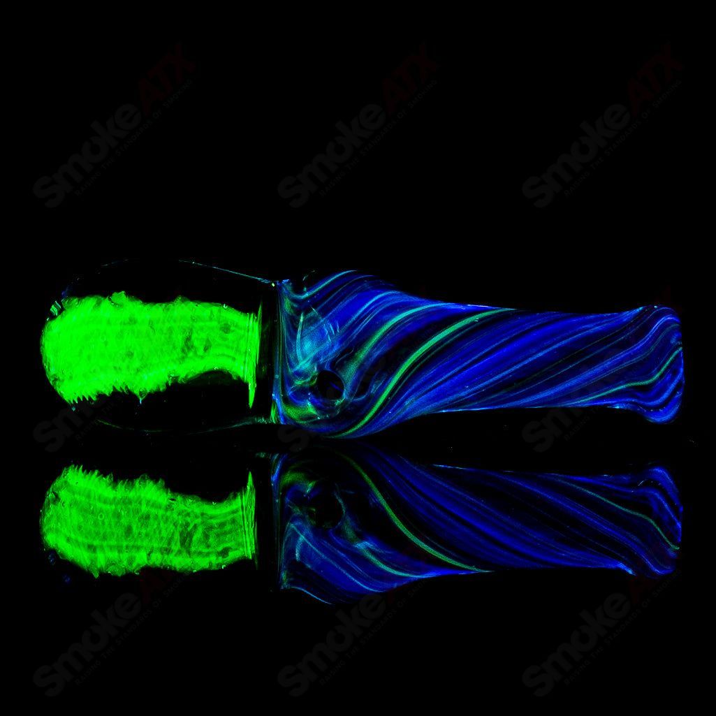 Colorful UV Puffco Joystick Indo heady glass piece by Geoff Made Glass, designed for Puffco tops, featuring intricate glasswork.
