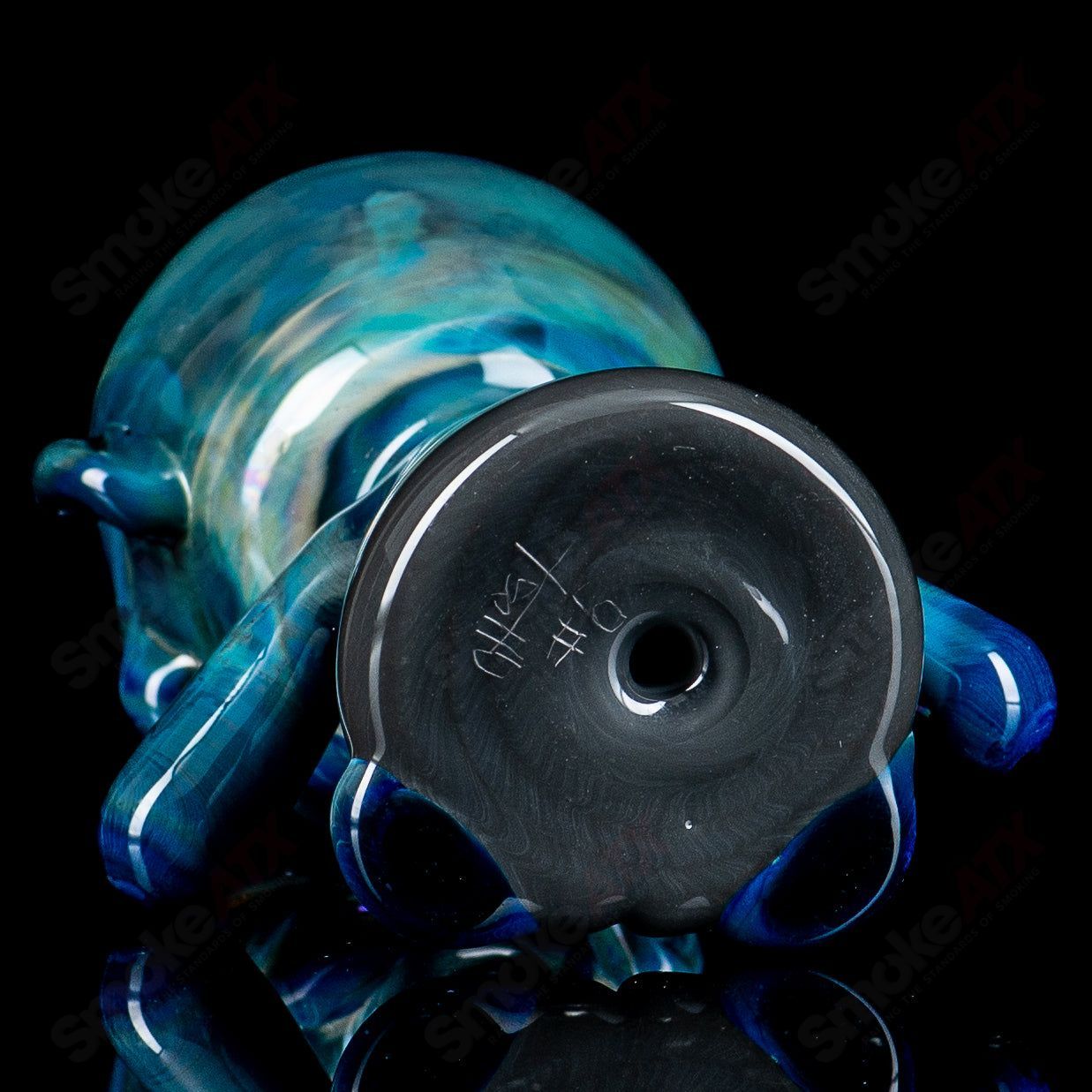 Ghost 7 Zombie Hand Pipe, a heady glass hand pipe designed like a zombie hand with detailed features and a functional bowl.