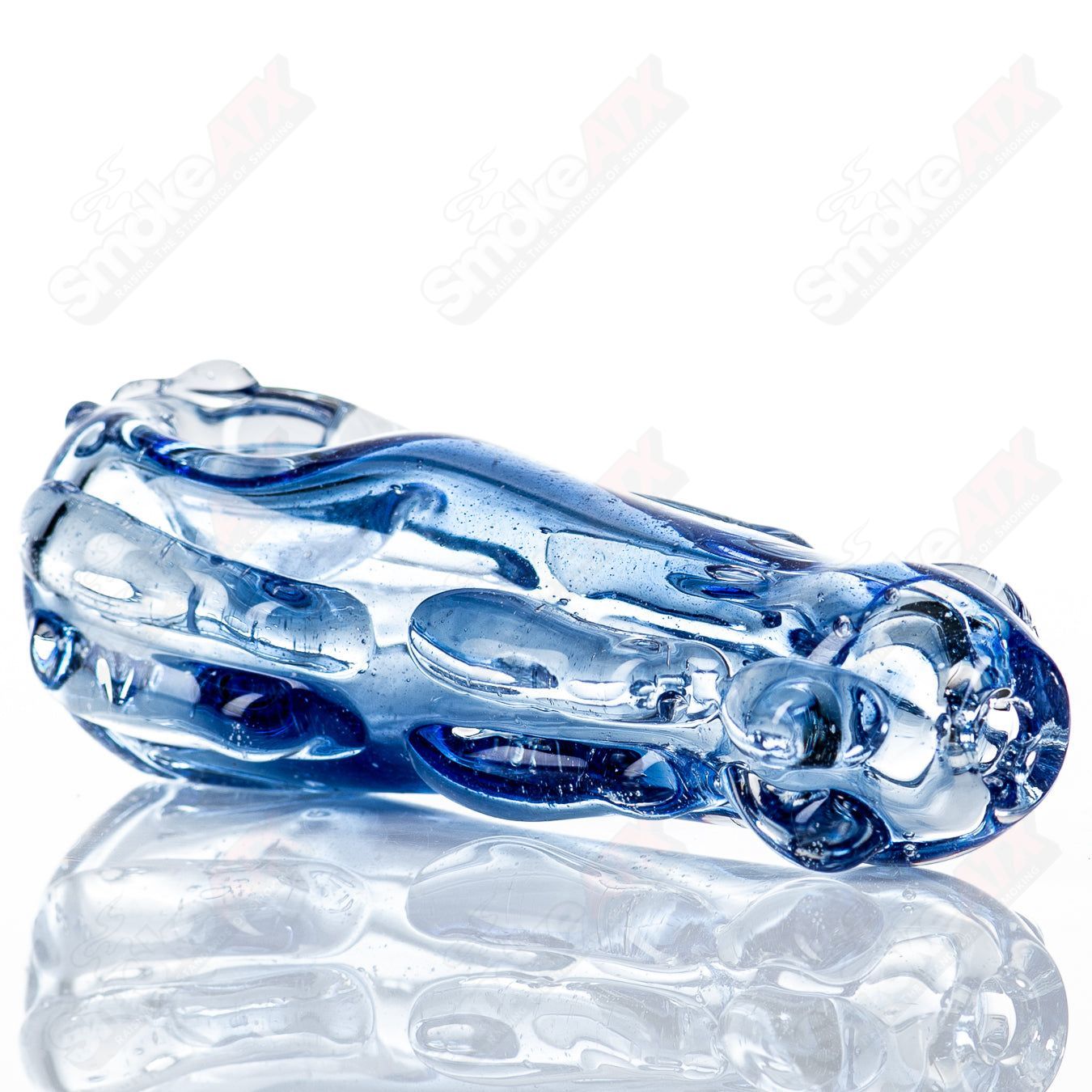 Spoon-shaped glass pipe by Nobody featuring a clear glass design, commonly used for smoking purposes.