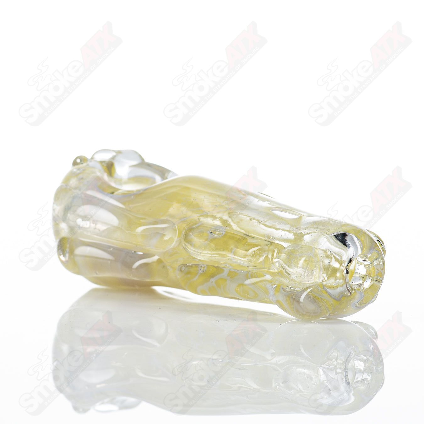 Clear glass spoon pipe by Nobody featuring a smooth, rounded bowl and slender stem, ideal for smoking use.